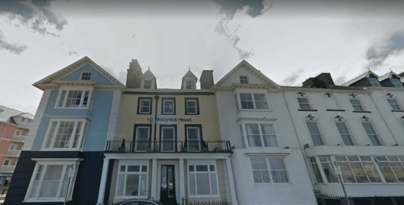 Man arrested over Ty Belgrave House hotel fire