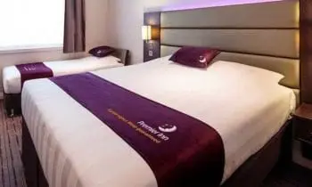 Whitbread swings to £724m statutory loss